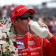 Scott Dixon, winner of the 92nd running of the Indy 500 in 2008, chugs a bottle of the good stuff. Photo credit Getty Images